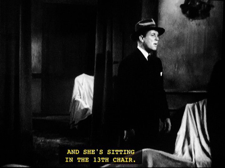 a screen capture from the 1943 B movie, "Mystery of the 13th Guest"