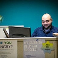 student sitting at a computer
