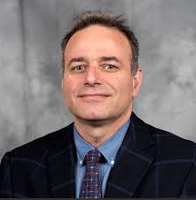 headshot of discussion lead