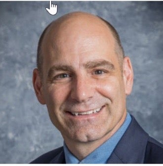 Dr. John Holcomb, Jr.