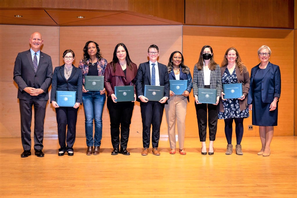 distinguished faculty and librarians achieved promotions