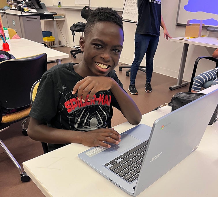 Student working on a laptop