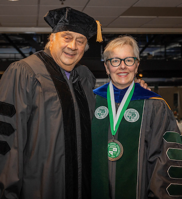 Pres. Bloomberg and Kid Leo at the Fall 2022 Commencement