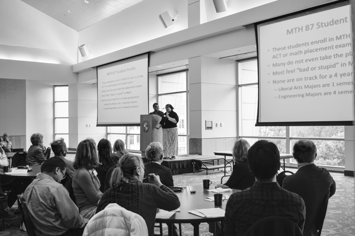 Dr. Sandra Chincholkar and Mohsen Manouchehri, presenting their "Pursue-thru-Two: MTH 87 & 116 in One Semester" at the Provost's Teaching Summit on May 1, 2017.  