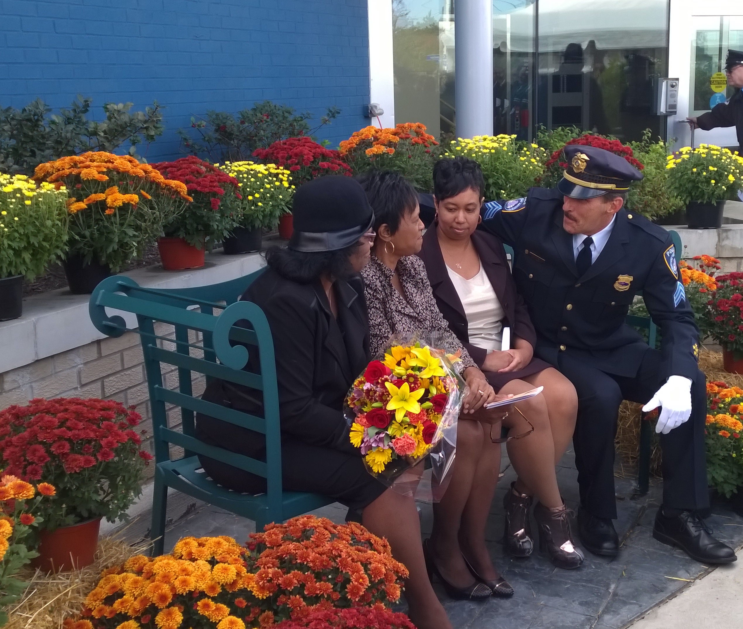 Dr. Diane Dillard-Mitchell, Members of the Dillard-Mitchell Family, and Sgt. Richard Flaherty