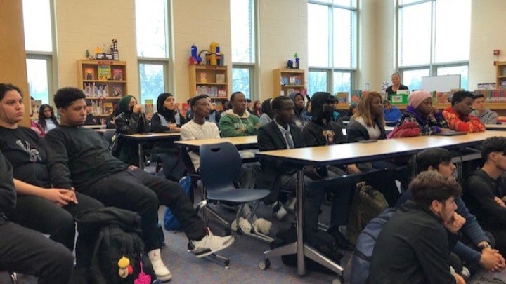 CMSD Newcomer Academy students listening to presentation