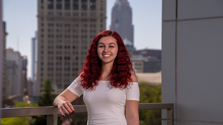 Vivian France posing in front of CSU skyline