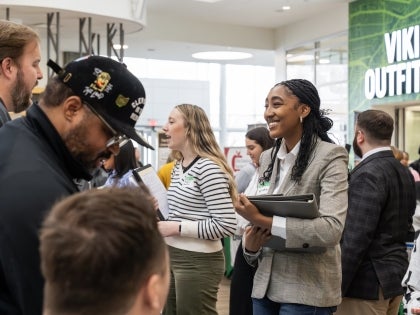 Smiling CSU Students at the CSU Career Fair