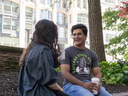 Students chatting near campus