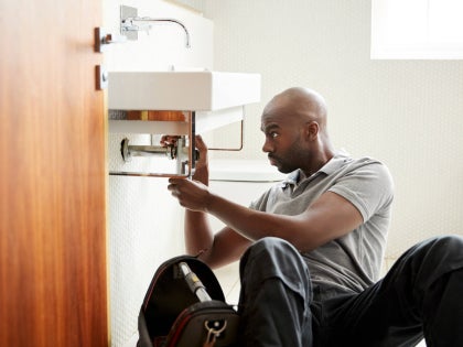 man working a a plumber.