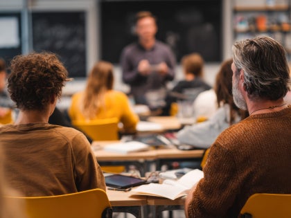 Group of adult learners in a classroom
