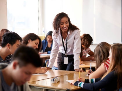 Professor working with students