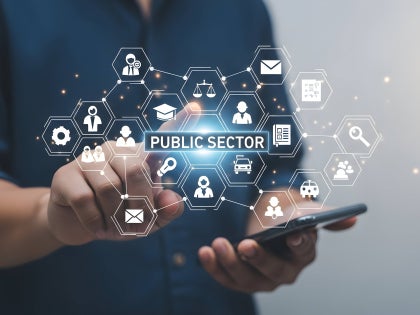 Man looking at multiple public management areas