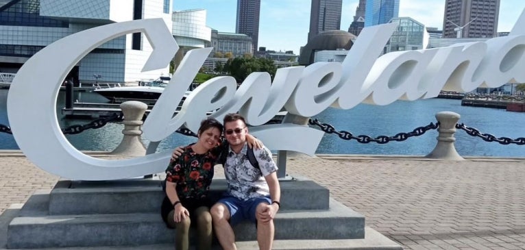 students in front of Cleveland sign